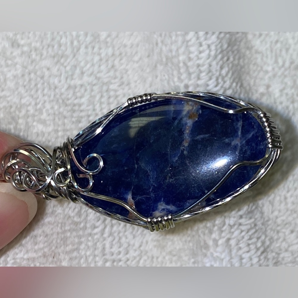 COPY- Sodalite carved stone disc pendant